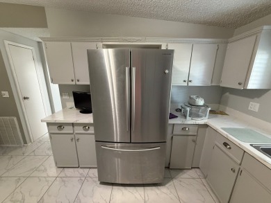 Located in highly sought after Pine Lakes, an Executive 18 Hole on Pine Lakes Country Club in Florida - for sale on GolfHomes.com, golf home, golf lot