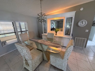 Located in highly sought after Pine Lakes, an Executive 18 Hole on Pine Lakes Country Club in Florida - for sale on GolfHomes.com, golf home, golf lot