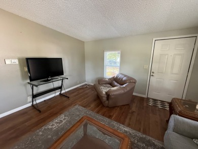 Located in highly sought after Pine Lakes, an Executive 18 Hole on Pine Lakes Country Club in Florida - for sale on GolfHomes.com, golf home, golf lot
