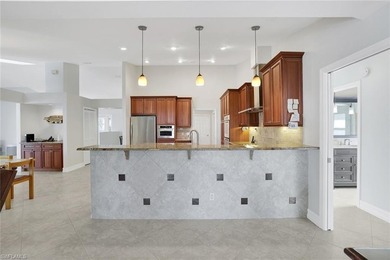 Situated on more than half an acre in the Imperial Golf Estates on Imperial Golf Club in Florida - for sale on GolfHomes.com, golf home, golf lot