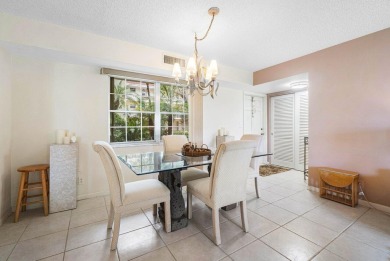 Wonderful First Floor 2 bedroom 2 bath end unit condo with on BallenIsles Golf and Country Club in Florida - for sale on GolfHomes.com, golf home, golf lot