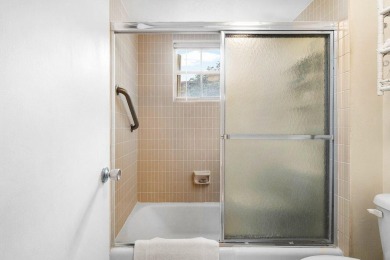 Wonderful First Floor 2 bedroom 2 bath end unit condo with on BallenIsles Golf and Country Club in Florida - for sale on GolfHomes.com, golf home, golf lot