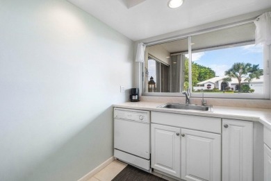 Wonderful First Floor 2 bedroom 2 bath end unit condo with on BallenIsles Golf and Country Club in Florida - for sale on GolfHomes.com, golf home, golf lot