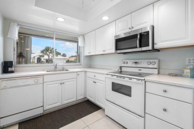 Wonderful First Floor 2 bedroom 2 bath end unit condo with on BallenIsles Golf and Country Club in Florida - for sale on GolfHomes.com, golf home, golf lot