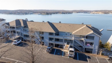 Imagine waking up to this million dollar lake view, unobstructed on Seasons Ridge At Four Seasons in Missouri - for sale on GolfHomes.com, golf home, golf lot