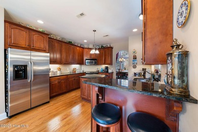 Discover all that this spacious home with exceptional golf & on Members Club At St. James Plantation in North Carolina - for sale on GolfHomes.com, golf home, golf lot