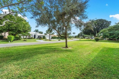 Wonderful First Floor 2 bedroom 2 bath end unit condo with on BallenIsles Golf and Country Club in Florida - for sale on GolfHomes.com, golf home, golf lot