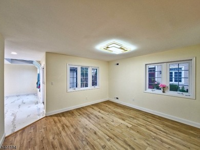 Welcome to this stunning, newly upgraded end-unit townhouse on Greenbriar At Whittingham in New Jersey - for sale on GolfHomes.com, golf home, golf lot