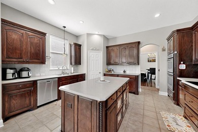 Experience refined living in this elegant 5-bedroom, 4-bath on Heritage Lakes - Par 3 - 9 Hole Course in Texas - for sale on GolfHomes.com, golf home, golf lot