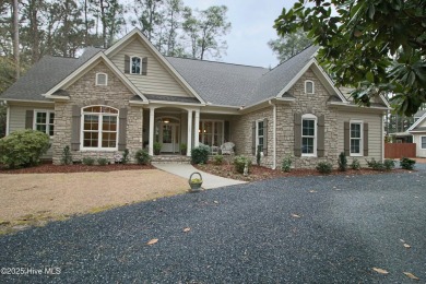 A beautiful Bundy Construction home nestled in the coveted on Pine Needles Lodge and Golf Club in North Carolina - for sale on GolfHomes.com, golf home, golf lot