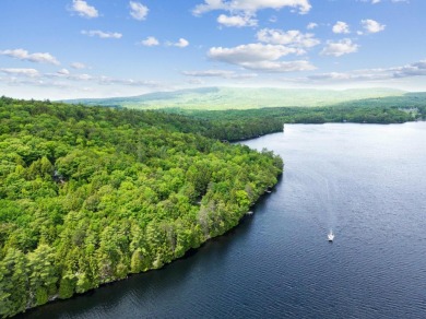 Great Rock House is a beautifully designed and built home sited on Belgrade Lakes Golf Club in Maine - for sale on GolfHomes.com, golf home, golf lot