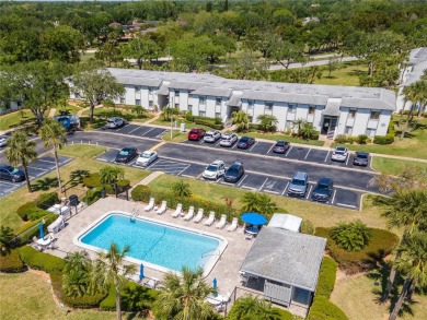Discover refined living in the heart of Cypress Estates at East on East Lake Woodlands Country Club in Florida - for sale on GolfHomes.com, golf home, golf lot