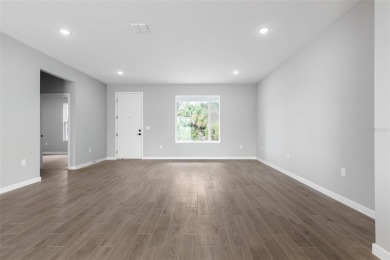 One or more photo(s) has been virtually staged. Walk to PINE on The Grand Club - Pine Lakes Course in Florida - for sale on GolfHomes.com, golf home, golf lot