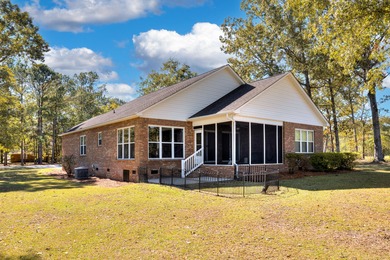 Beautiful patio home w/ golf course views of the #9 green & the on Players Course At Wyboo Plantation in South Carolina - for sale on GolfHomes.com, golf home, golf lot