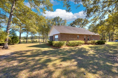 Beautiful patio home w/ golf course views of the #9 green & the on Players Course At Wyboo Plantation in South Carolina - for sale on GolfHomes.com, golf home, golf lot