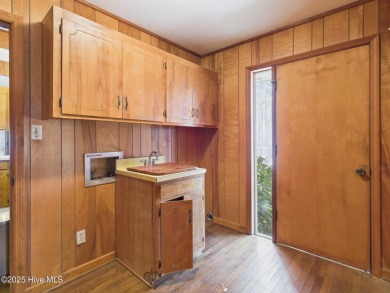 Welcome to an investor's dream! This offering includes a on Whispering Pines Golf Course in North Carolina - for sale on GolfHomes.com, golf home, golf lot