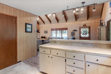 Have you ever seen a mountain cabin with a level driveway and a on Sequoia Woods Country Club in California - for sale on GolfHomes.com, golf home, golf lot