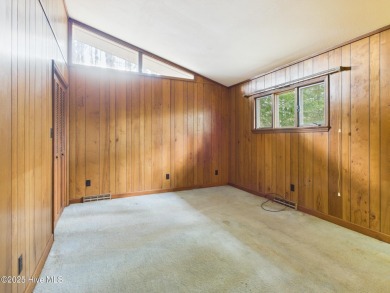 Welcome to an investor's dream! This offering includes a on Whispering Pines Golf Course in North Carolina - for sale on GolfHomes.com, golf home, golf lot
