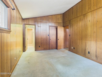 Welcome to an investor's dream! This offering includes a on Whispering Pines Golf Course in North Carolina - for sale on GolfHomes.com, golf home, golf lot