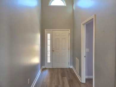 Beautiful patio home w/ golf course views of the #9 green & the on Players Course At Wyboo Plantation in South Carolina - for sale on GolfHomes.com, golf home, golf lot