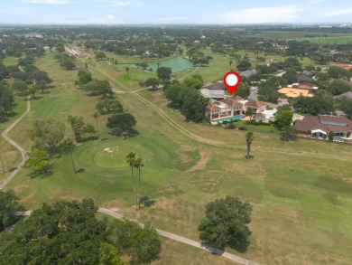 Exquisite 4 bedroom home on the 13th Fairway with lush on Harlingen Country Club in Texas - for sale on GolfHomes.com, golf home, golf lot