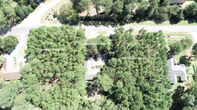 Welcome to an investor's dream! This offering includes a on Whispering Pines Golf Course in North Carolina - for sale on GolfHomes.com, golf home, golf lot