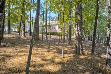 Private home on 1.66 acres in Woodside.  Set back a long on Woodside Plantation Country Club in South Carolina - for sale on GolfHomes.com, golf home, golf lot