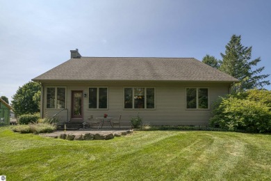 Enjoy main floor living! With this  3-bedroom, 2-bath home on Grand Traverse Resort and Spa in Michigan - for sale on GolfHomes.com, golf home, golf lot