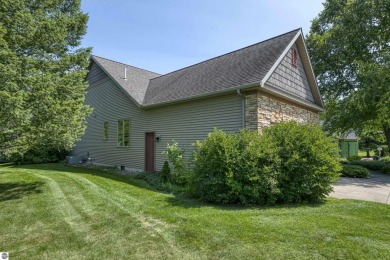 Enjoy main floor living! With this  3-bedroom, 2-bath home on Grand Traverse Resort and Spa in Michigan - for sale on GolfHomes.com, golf home, golf lot