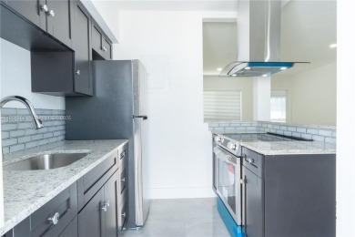Exceptional Miami Beach 4-plex in the sought-after Normandy on Normandy Shores Golf Course in Florida - for sale on GolfHomes.com, golf home, golf lot