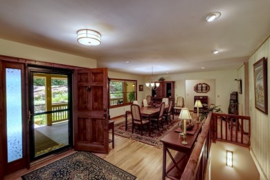 You will love coming home to this attractive and comfortable on Sapphire National Golf Club in North Carolina - for sale on GolfHomes.com, golf home, golf lot