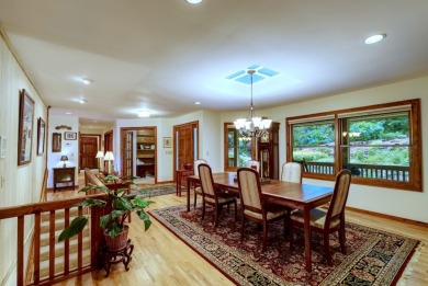 You will love coming home to this attractive and comfortable on Sapphire National Golf Club in North Carolina - for sale on GolfHomes.com, golf home, golf lot