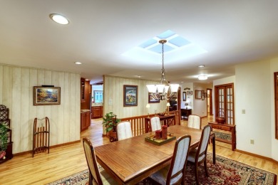 You will love coming home to this attractive and comfortable on Sapphire National Golf Club in North Carolina - for sale on GolfHomes.com, golf home, golf lot