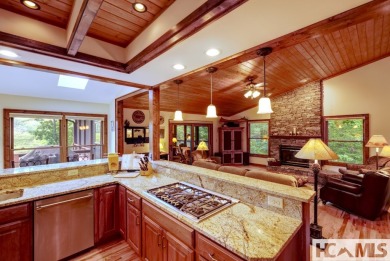 You will love coming home to this attractive and comfortable on Sapphire National Golf Club in North Carolina - for sale on GolfHomes.com, golf home, golf lot