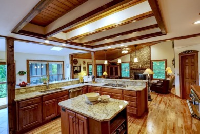 You will love coming home to this attractive and comfortable on Sapphire National Golf Club in North Carolina - for sale on GolfHomes.com, golf home, golf lot