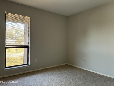 Two bedroom condo on the golf course with a deck and great views on Diamondhead Country Club in Mississippi - for sale on GolfHomes.com, golf home, golf lot