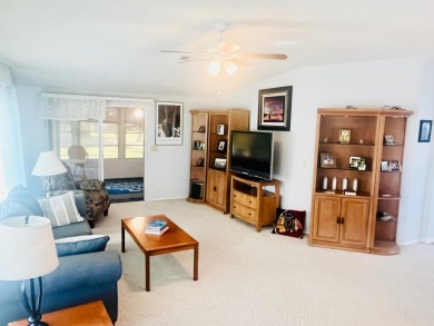 Discover Your New Home! This spacious two-bedroom, two-bath home on Pine Lakes Country Club in Florida - for sale on GolfHomes.com, golf home, golf lot
