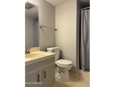 Two bedroom condo on the golf course with a deck and great views on Diamondhead Country Club in Mississippi - for sale on GolfHomes.com, golf home, golf lot