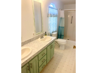 Discover Your New Home! This spacious two-bedroom, two-bath home on Pine Lakes Country Club in Florida - for sale on GolfHomes.com, golf home, golf lot