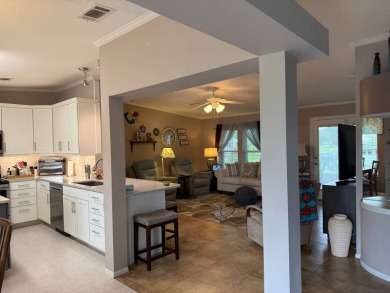 This lovely, 3 bedroom, 2 bath manufactured home is located in on Pine Lakes Country Club in Florida - for sale on GolfHomes.com, golf home, golf lot
