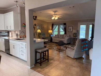This lovely, 3 bedroom, 2 bath manufactured home is located in on Pine Lakes Country Club in Florida - for sale on GolfHomes.com, golf home, golf lot