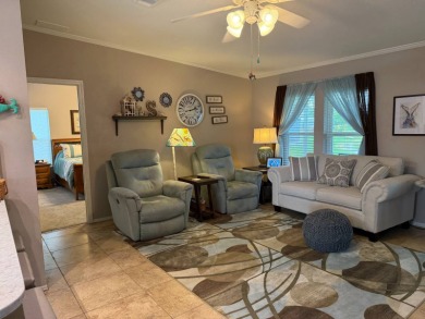 This lovely, 3 bedroom, 2 bath manufactured home is located in on Pine Lakes Country Club in Florida - for sale on GolfHomes.com, golf home, golf lot