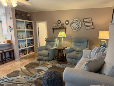 This lovely, 3 bedroom, 2 bath manufactured home is located in on Pine Lakes Country Club in Florida - for sale on GolfHomes.com, golf home, golf lot