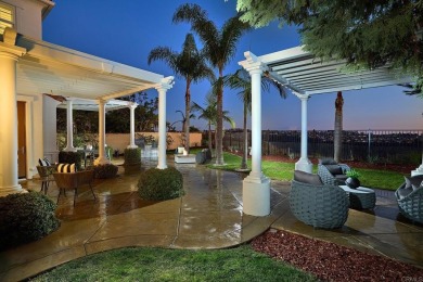 Perched on a premium elevated lot, this remarkable home offers on La Costa Resort and Spa in California - for sale on GolfHomes.com, golf home, golf lot