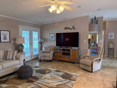This lovely, 3 bedroom, 2 bath manufactured home is located in on Pine Lakes Country Club in Florida - for sale on GolfHomes.com, golf home, golf lot
