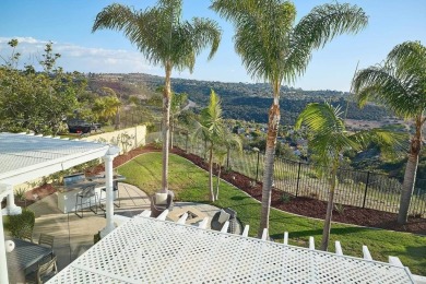 Perched on a premium elevated lot, this remarkable home offers on La Costa Resort and Spa in California - for sale on GolfHomes.com, golf home, golf lot