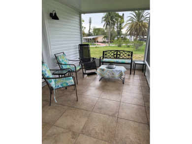 This lovely, 3 bedroom, 2 bath manufactured home is located in on Pine Lakes Country Club in Florida - for sale on GolfHomes.com, golf home, golf lot