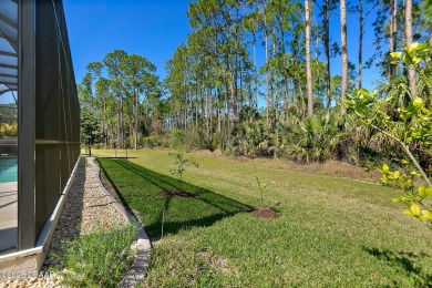 Highly-customized, immaculately-maintained Cameron model on Plantation Bay Golf and Country Club in Florida - for sale on GolfHomes.com, golf home, golf lot