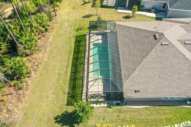 Highly-customized, immaculately-maintained Cameron model on Plantation Bay Golf and Country Club in Florida - for sale on GolfHomes.com, golf home, golf lot