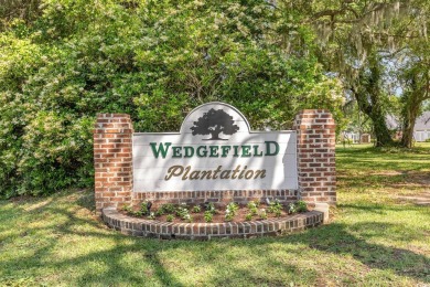 LOOK!!! PRICE REDUCTION! LOWEST PRICED 4 BEDROOM HOME IN on Wedgefield Plantation Golf Club in South Carolina - for sale on GolfHomes.com, golf home, golf lot